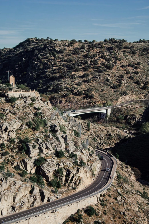 a view of a road near some cliffs