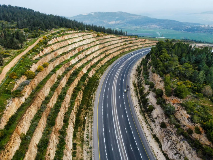 an aerial view of an empty highway that has been cut off