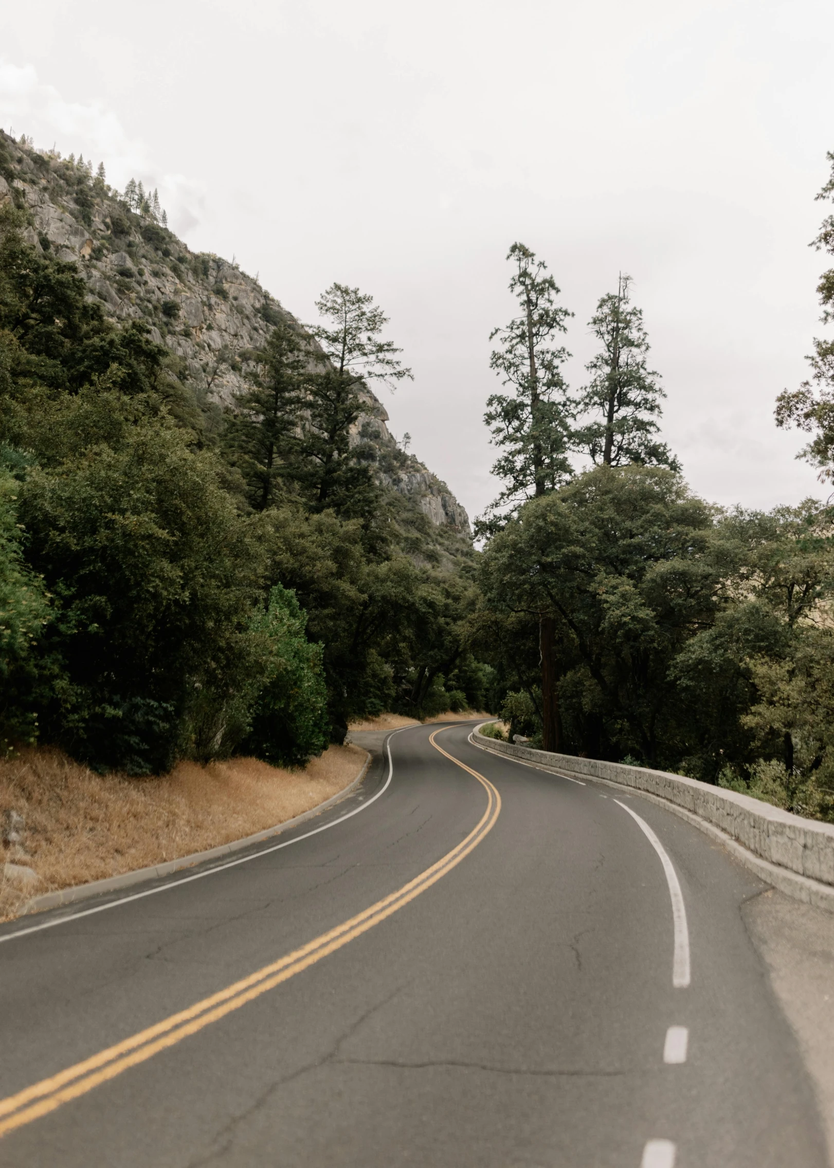 a picture of an empty mountain road