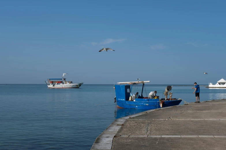 a group of people near a body of water