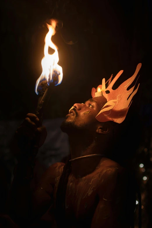 man with a fire face with flames in his hair