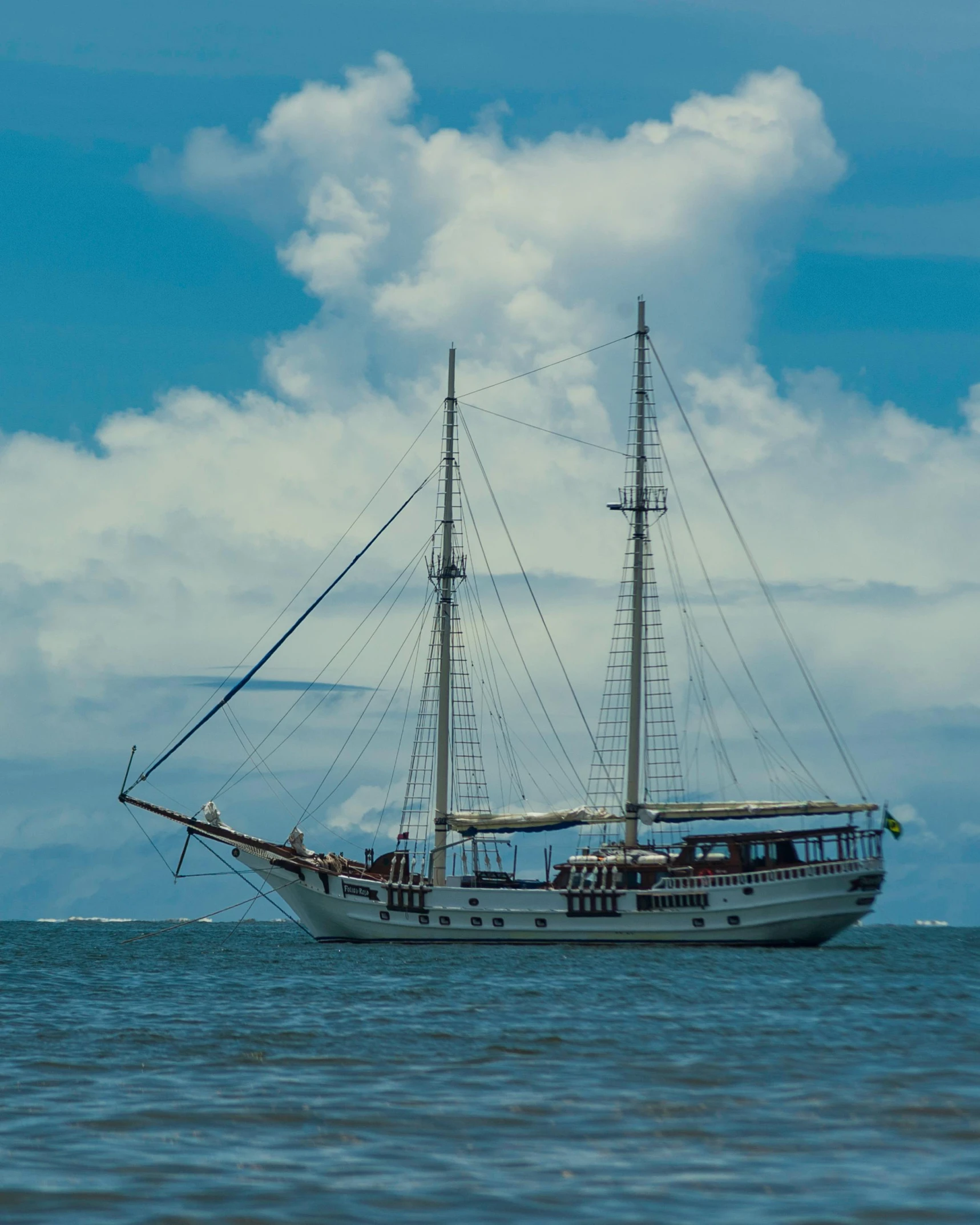 a sailboat is sailing on the open water