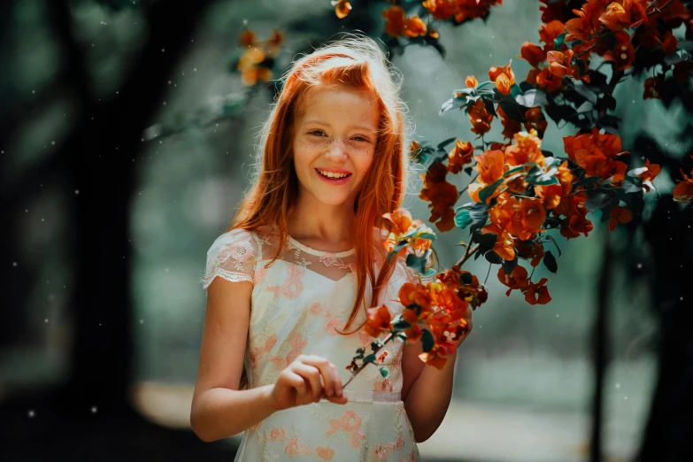 a  holds flowers outside on a rainy day