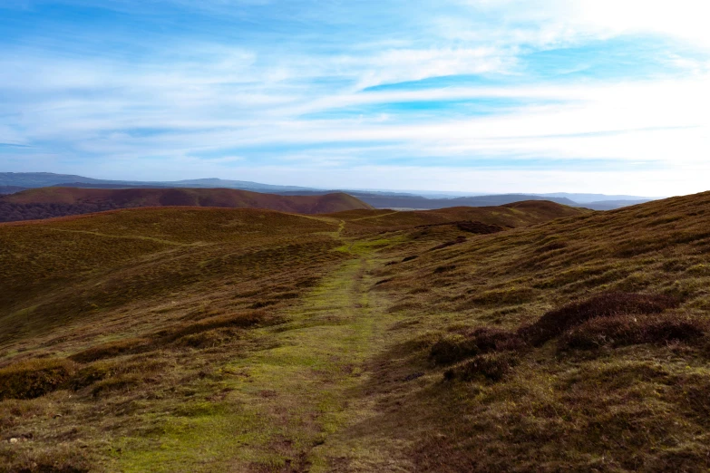 a field that has some very big hills in it