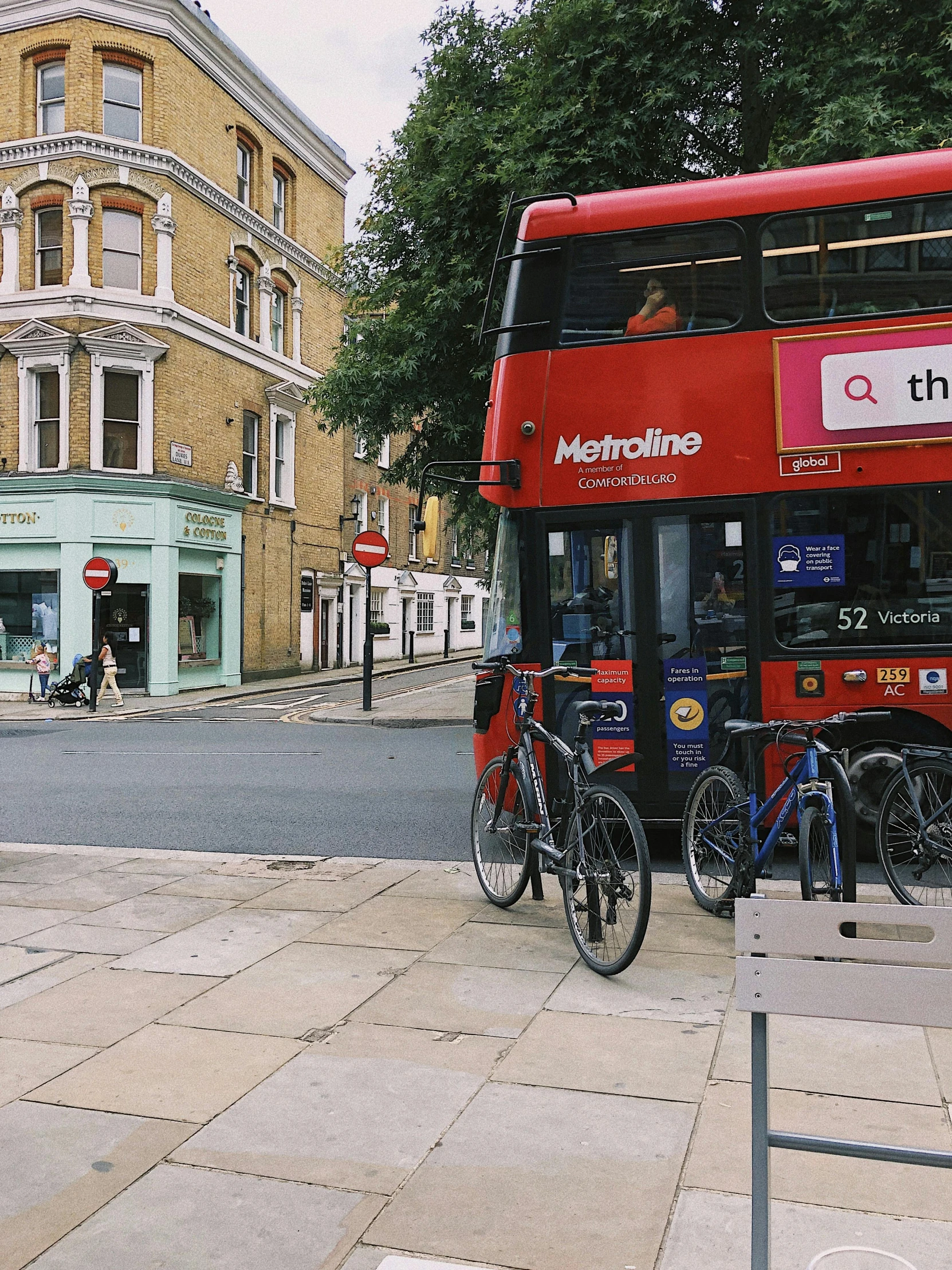 a double decker bus parked on the side of the road