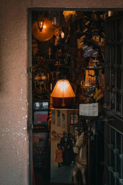 lamp and pictures on shelves in a store