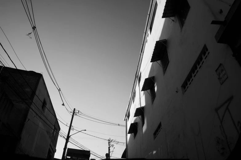 an alleyway in a city that seems to be rundown