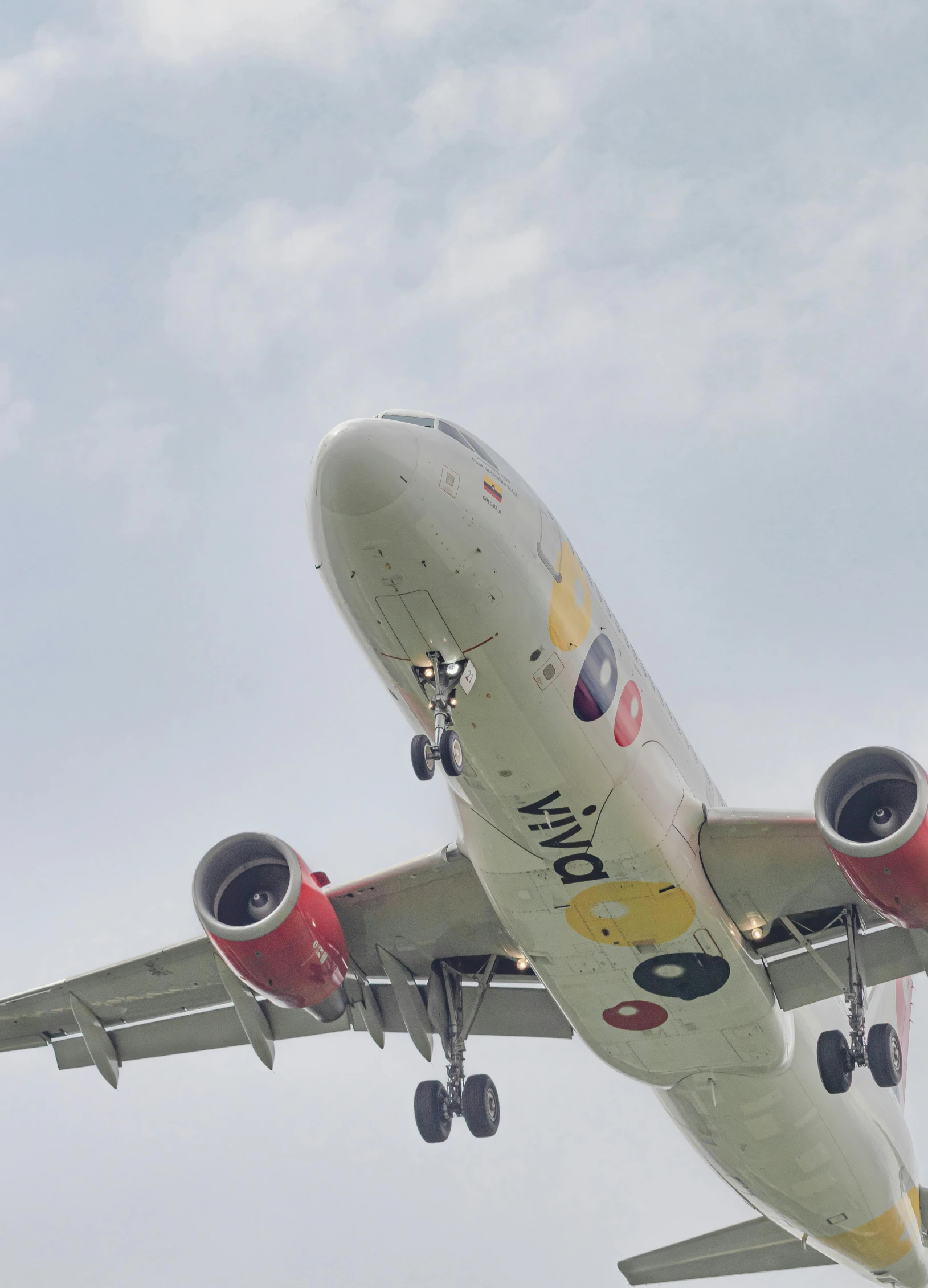 the back end of a commercial airliner flying in the air