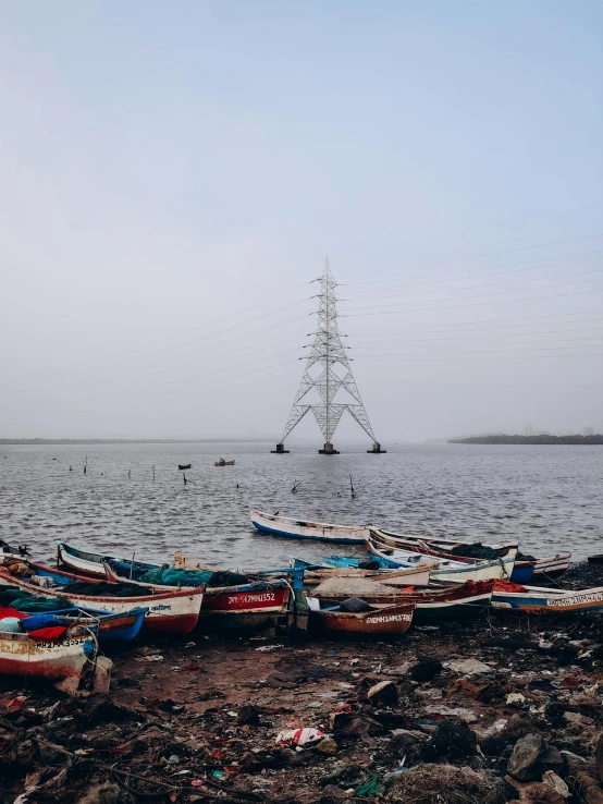 boats on a lake next to each other