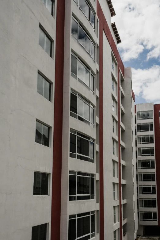 an image of a building with windows looking up