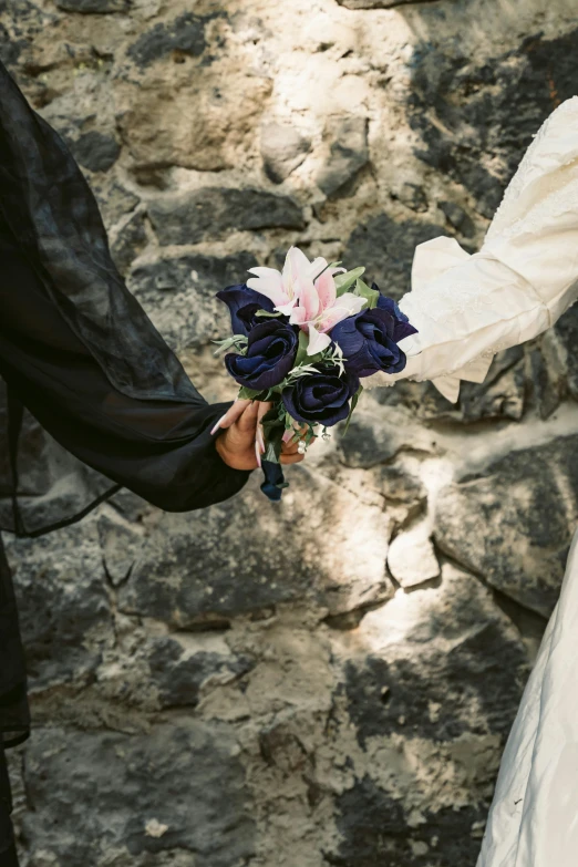 this bride is holding her bouquet on her wedding day