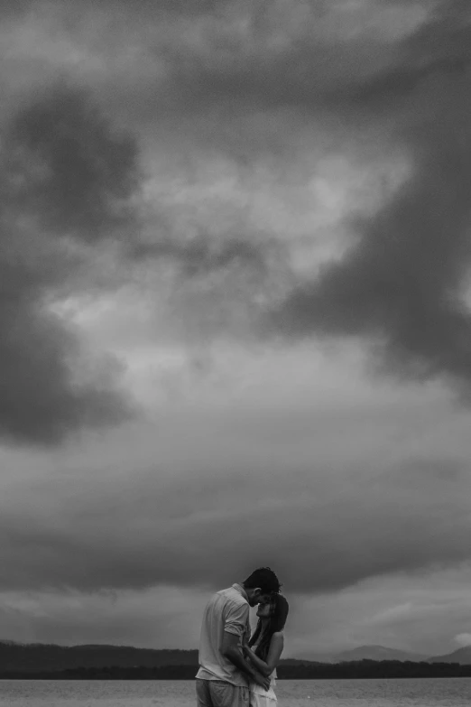 black and white pograph of a man and woman on a boat