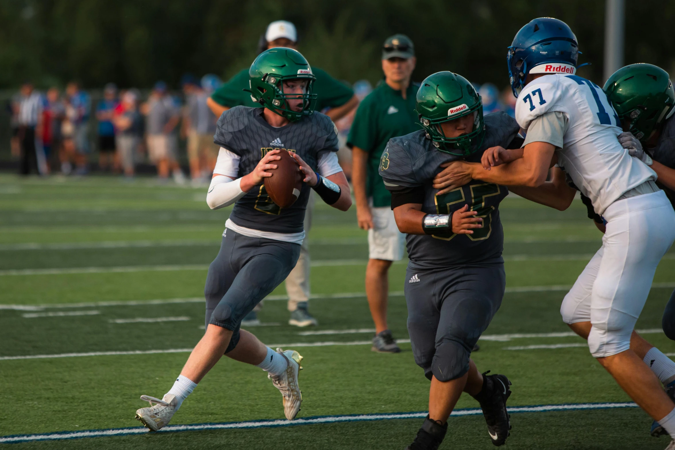 there is a football game being played with the opposing teams