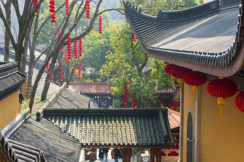 red lanterns hung from the roofs of buildings