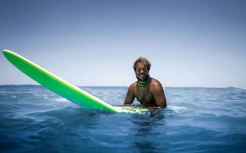 a man is surfing the waves on his surf board