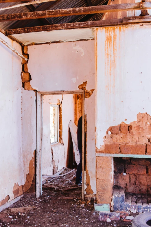 a room with two doorways that have a missing wall