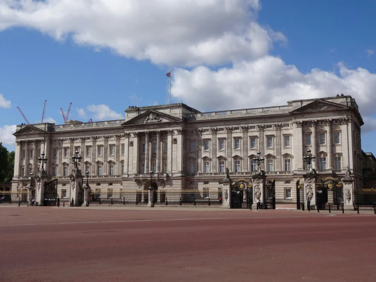 the large white building has many windows