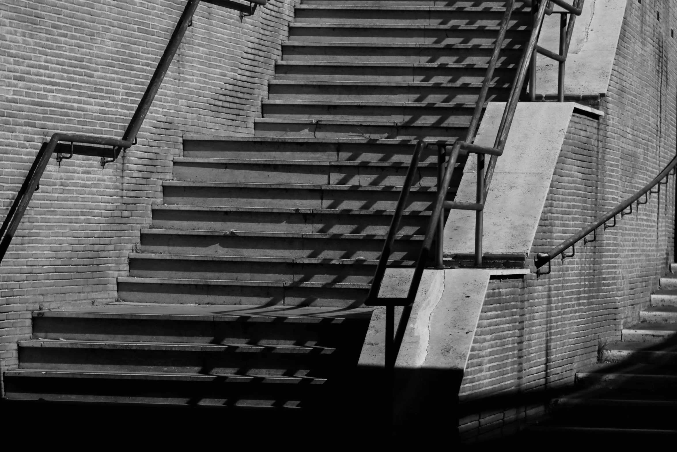 a very nice set of stairs with some lights above