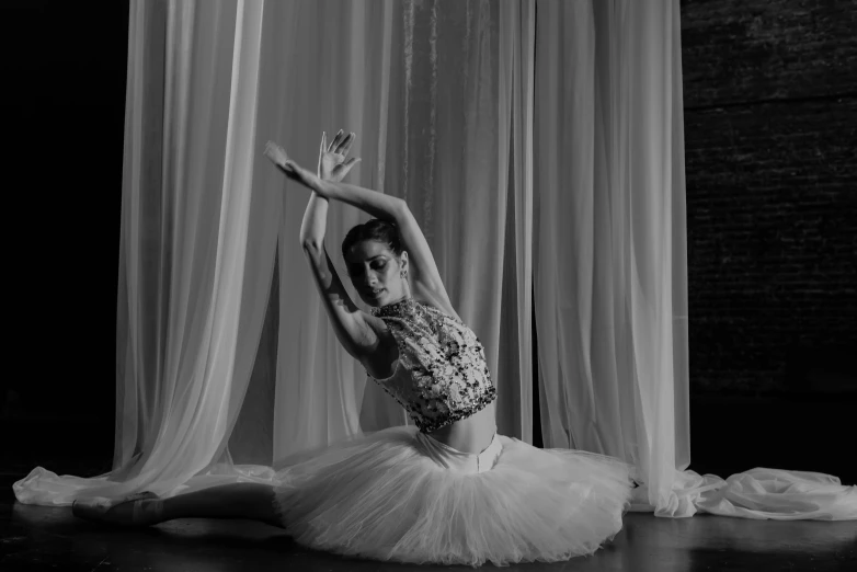 a woman in a tutu and a long sleeved dress