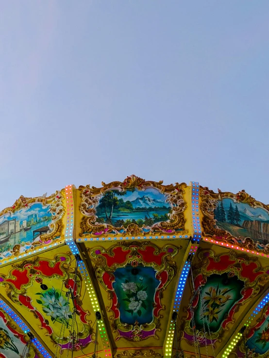 the top of an old fashioned carousel ride