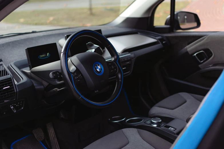 a view of a car dashboard from the driver's side