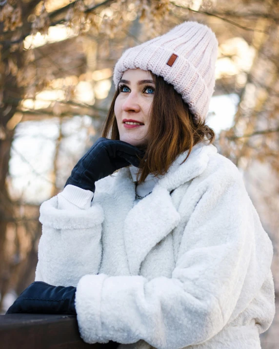 the young woman is posing for a portrait