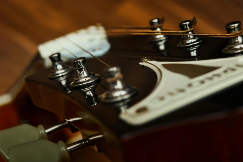 a close up of an electric guitar's humbuck