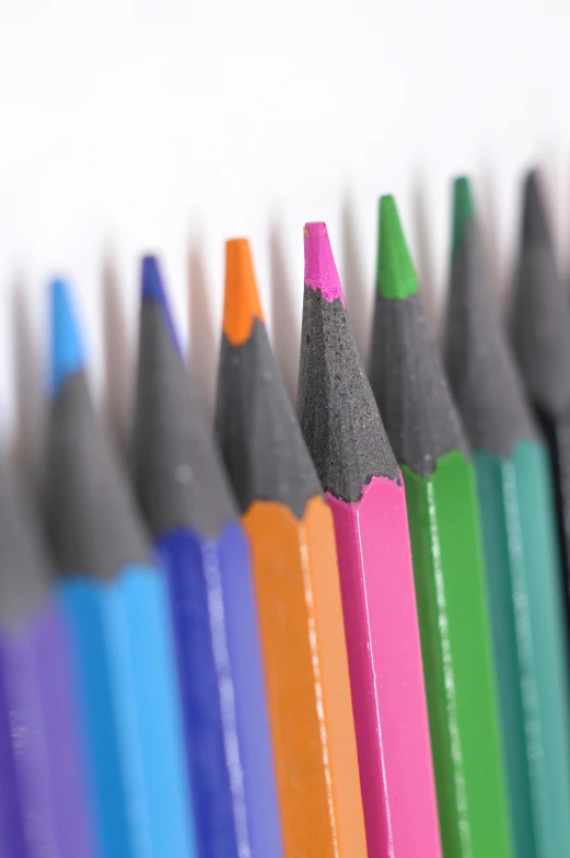 close up of multiple pencils arranged on each other