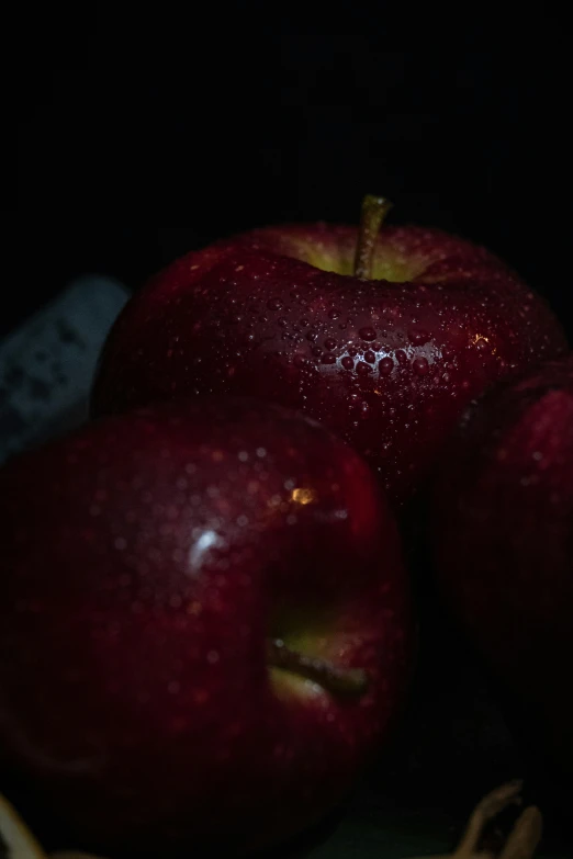 a close up of a group of apples and bananas