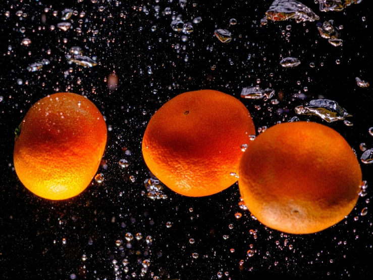 some fruit is being soaked in water on a table