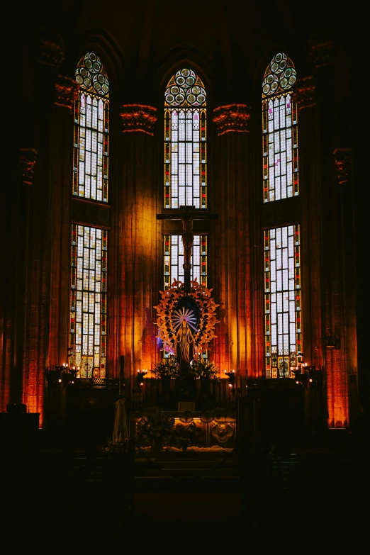 the lights shine brightly down on this ornate church