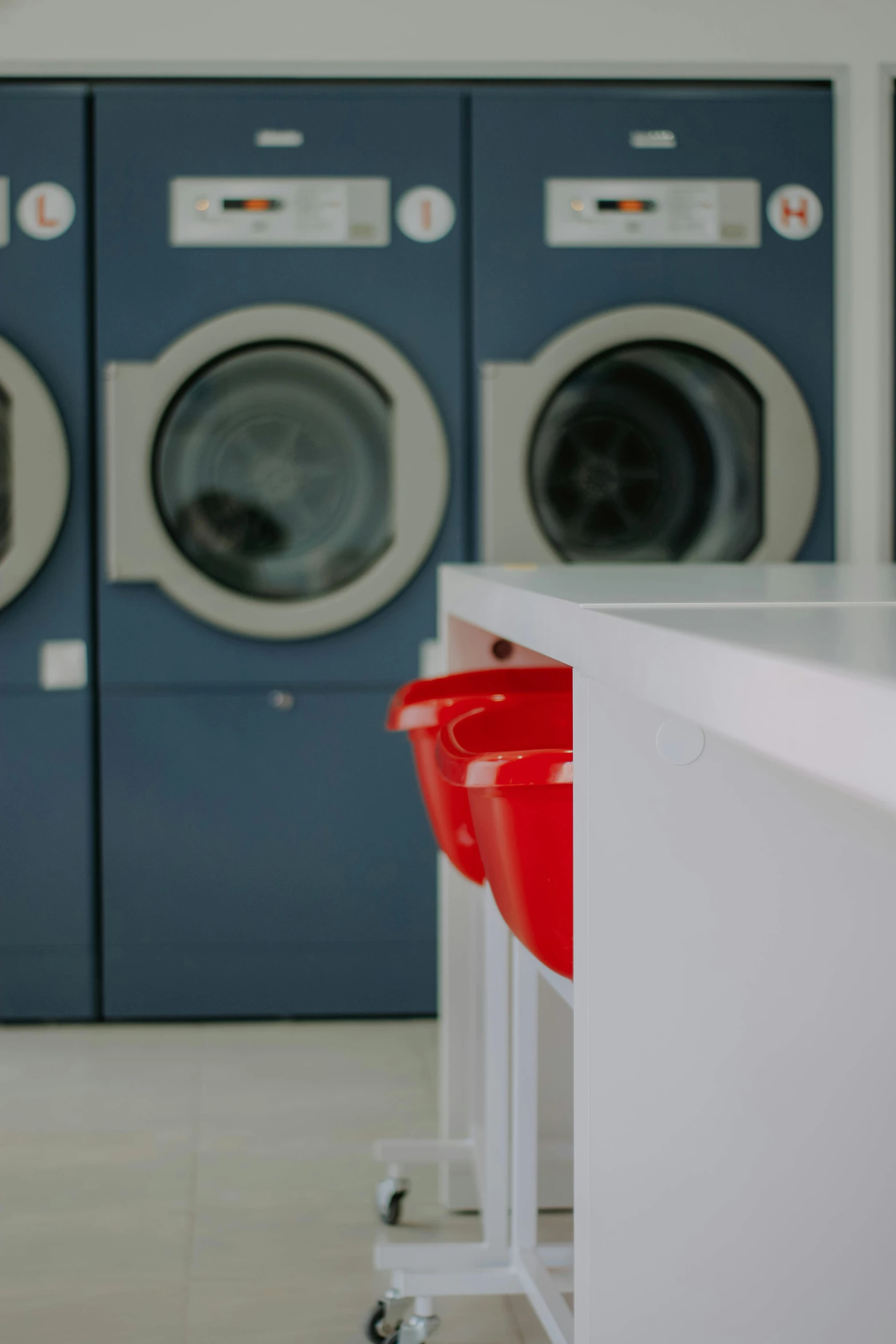 there are a few washers and dryers in this room