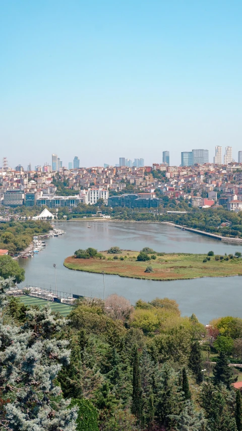 an area of land surrounded by water surrounded by buildings