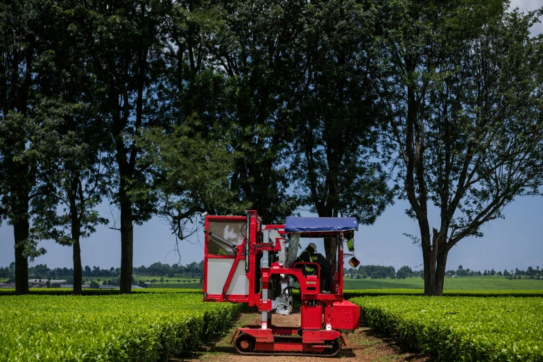 an image of a tractor in the middle of a field