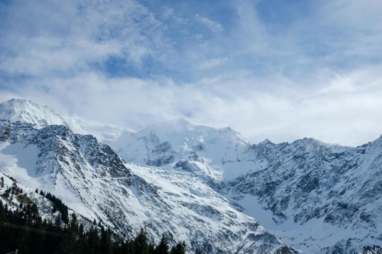 a bunch of mountains are shown on a sunny day