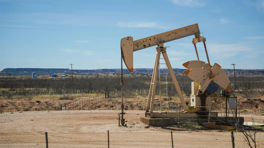 an oil pump in the middle of the desert