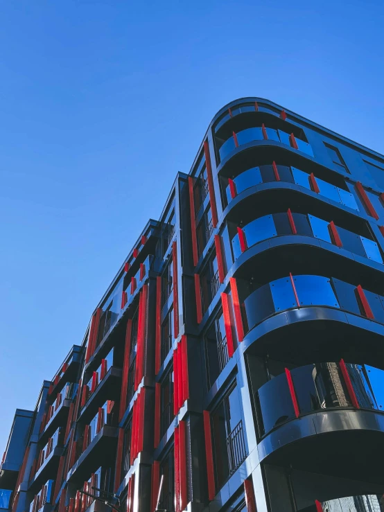 a tall building with many windows on top of it