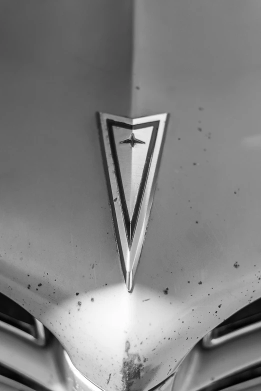 black and white po of an emblem on a car