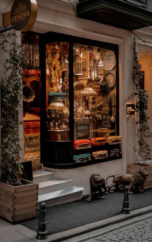 a storefront with wooden slat dogs standing on the street