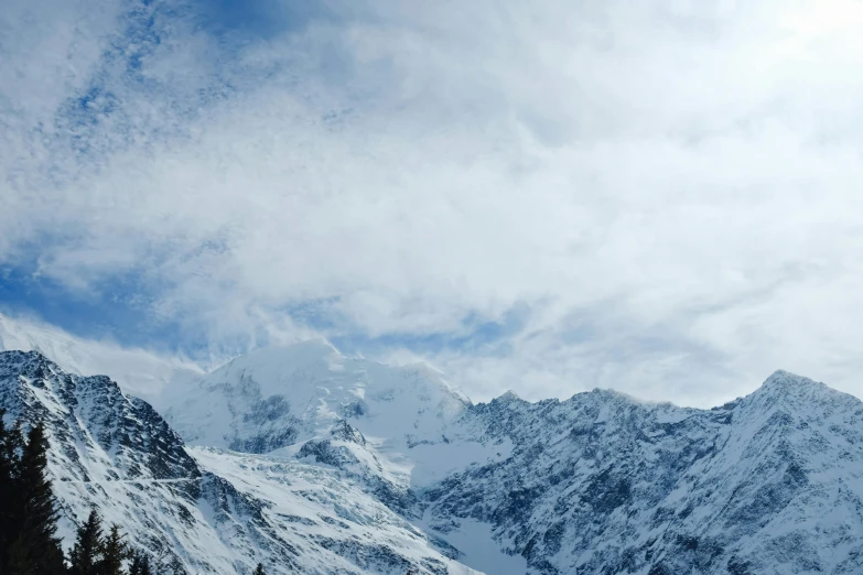 there is a mountain range with snow on it