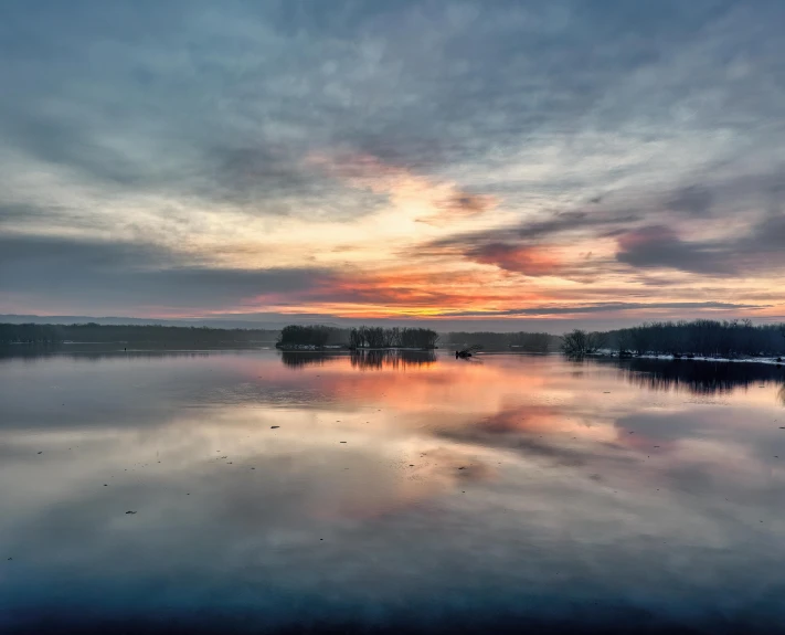 an image of a beautiful sunrise taken from a pier