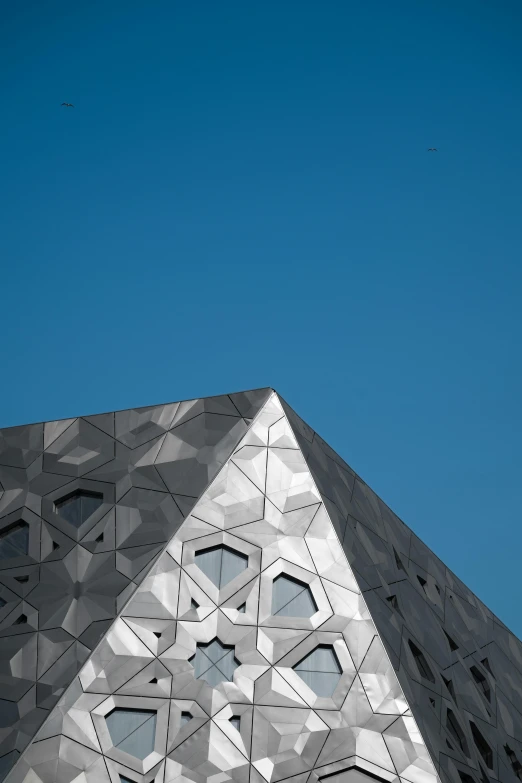 triangular geometric design in front of an office building