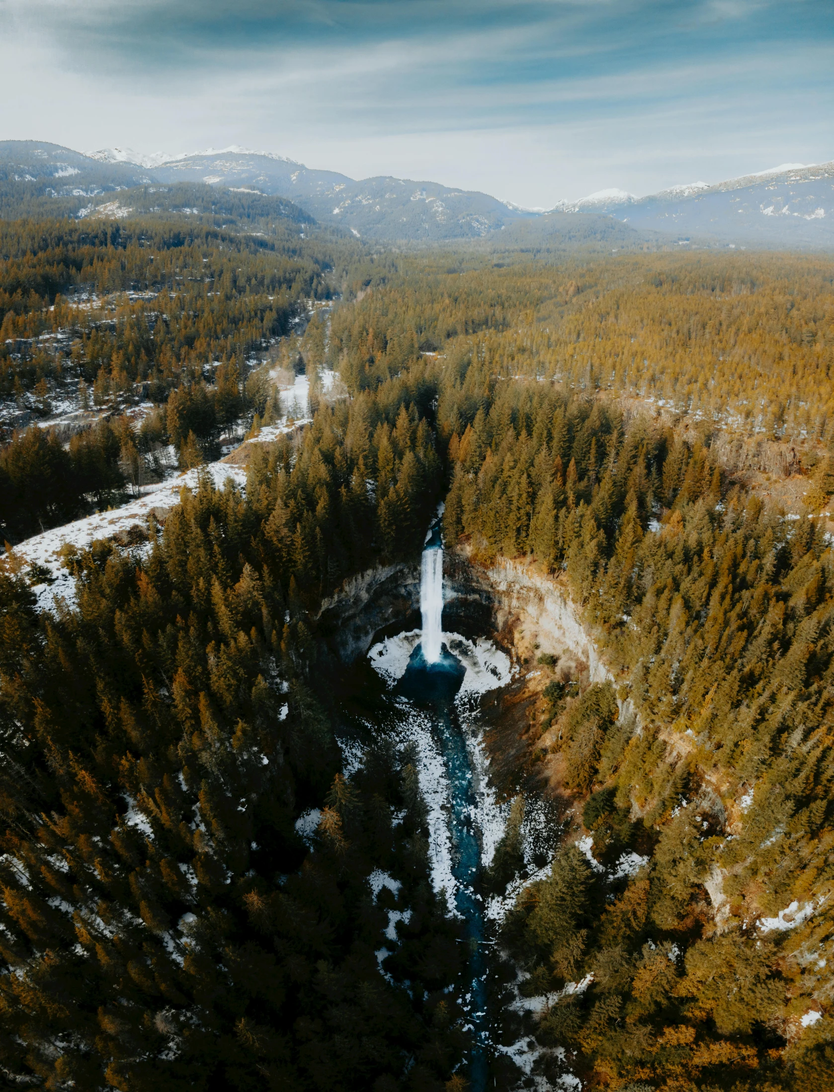 an aerial s of a scenic landscape in winter