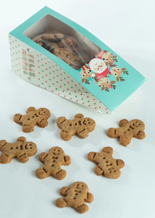 some cookies in the shape of stars next to a card