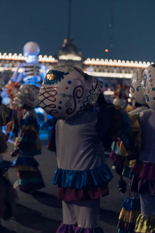 the group of s in costume is on a street