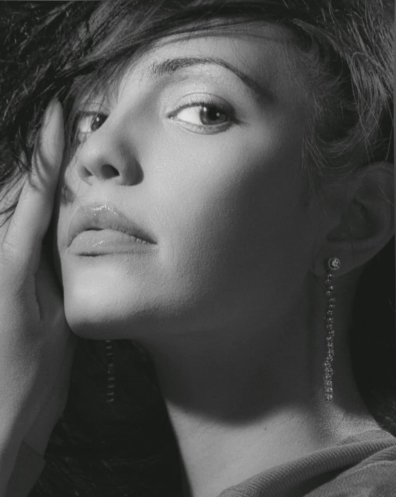 black and white pograph of a woman looking up