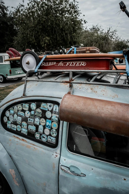 a small car with a canoe on top