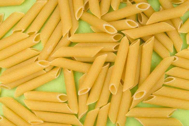 a pile of pennets on a cloth table