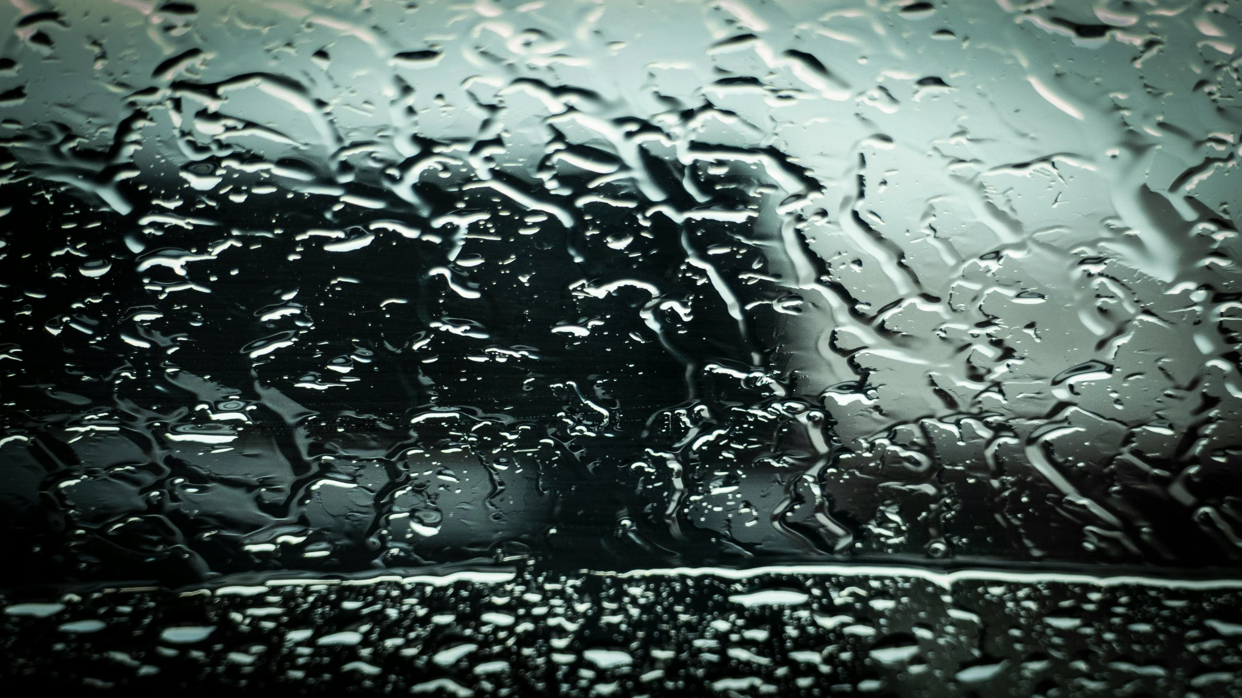 water droplets on the glass of a rainy vehicle