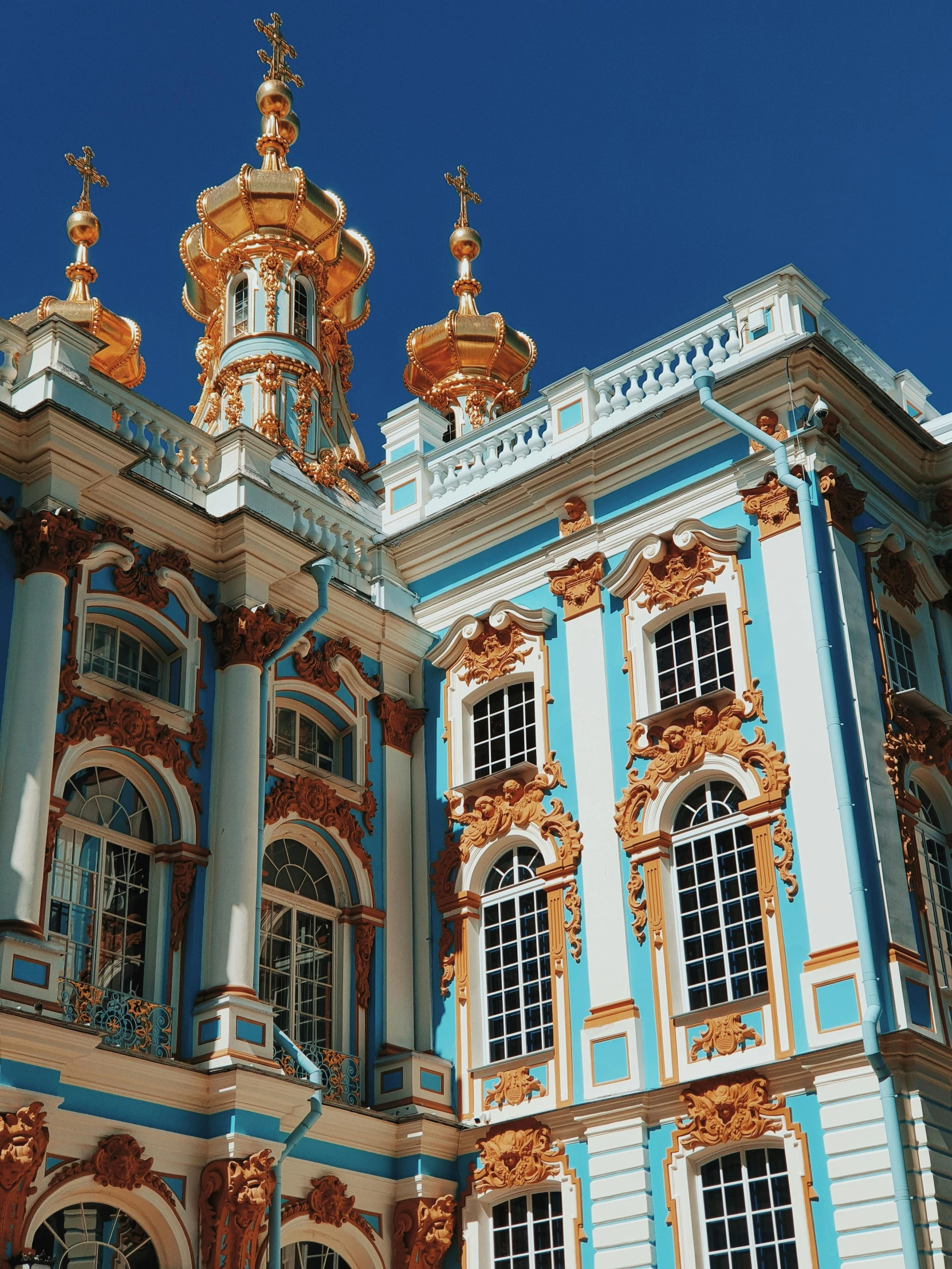 an ornate building with a blue sky background